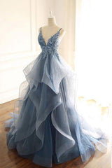 tulle long prom dress with spaghetti straps and ruffled floor length skirt