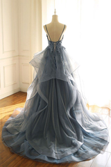 tulle long prom dress with spaghetti straps and ruffled floor length skirt